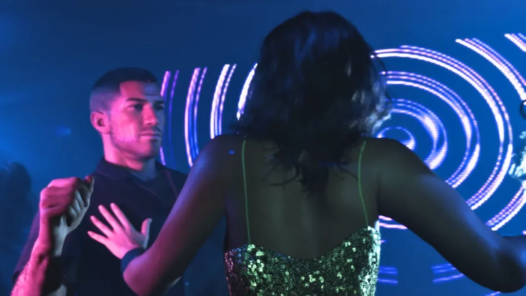 Jason and Lucia dancing in a neon-lit nightclub in GTA 6 Trailer 2, with glowing visuals and club atmosphere.