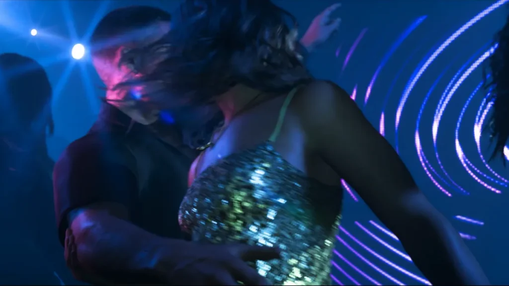 Lucia Caminos Jason and Lucia dancing in a nightclub in GTA 6 Trailer 2, surrounded by neon lights and energetic vibes.